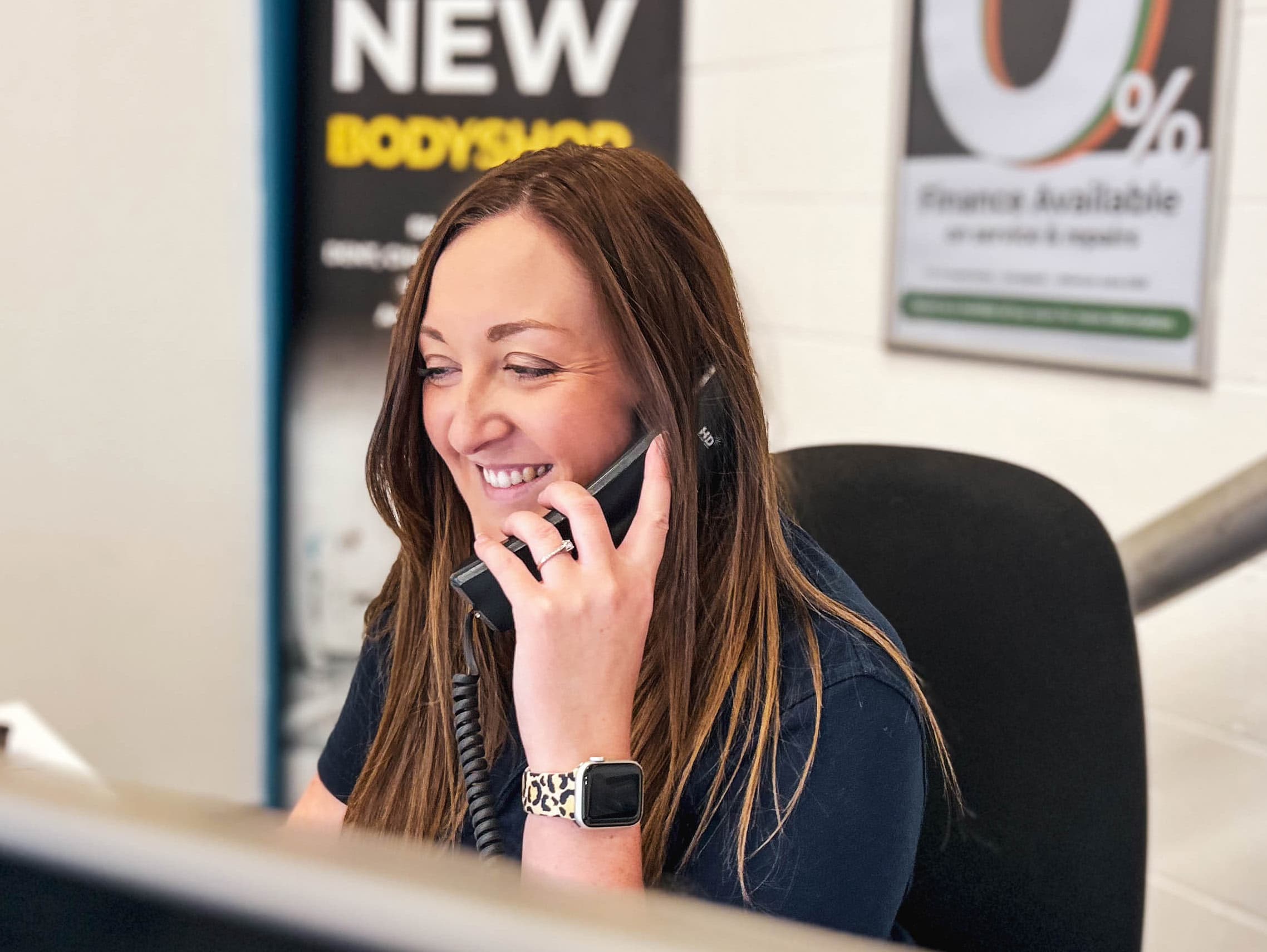 Dack team member taking a booking by phone